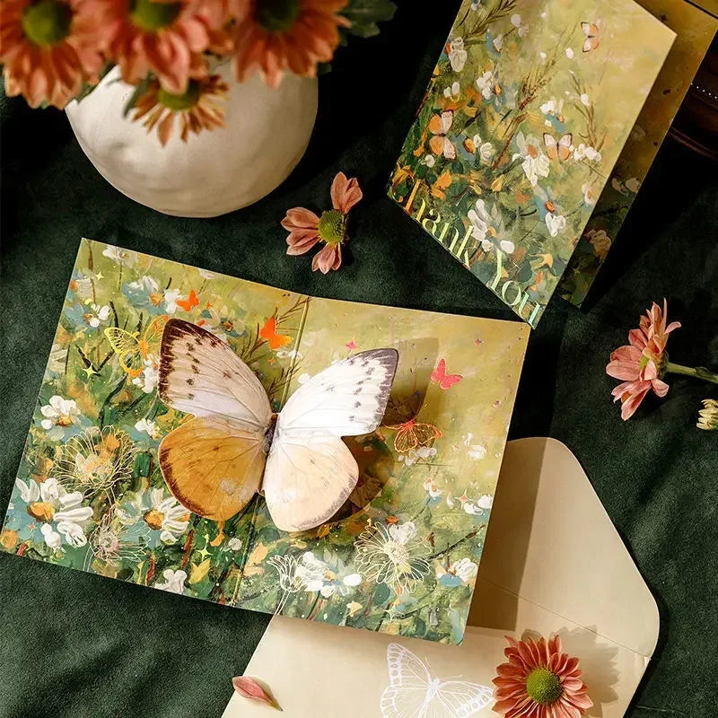Carte pop up fleurs, papillon